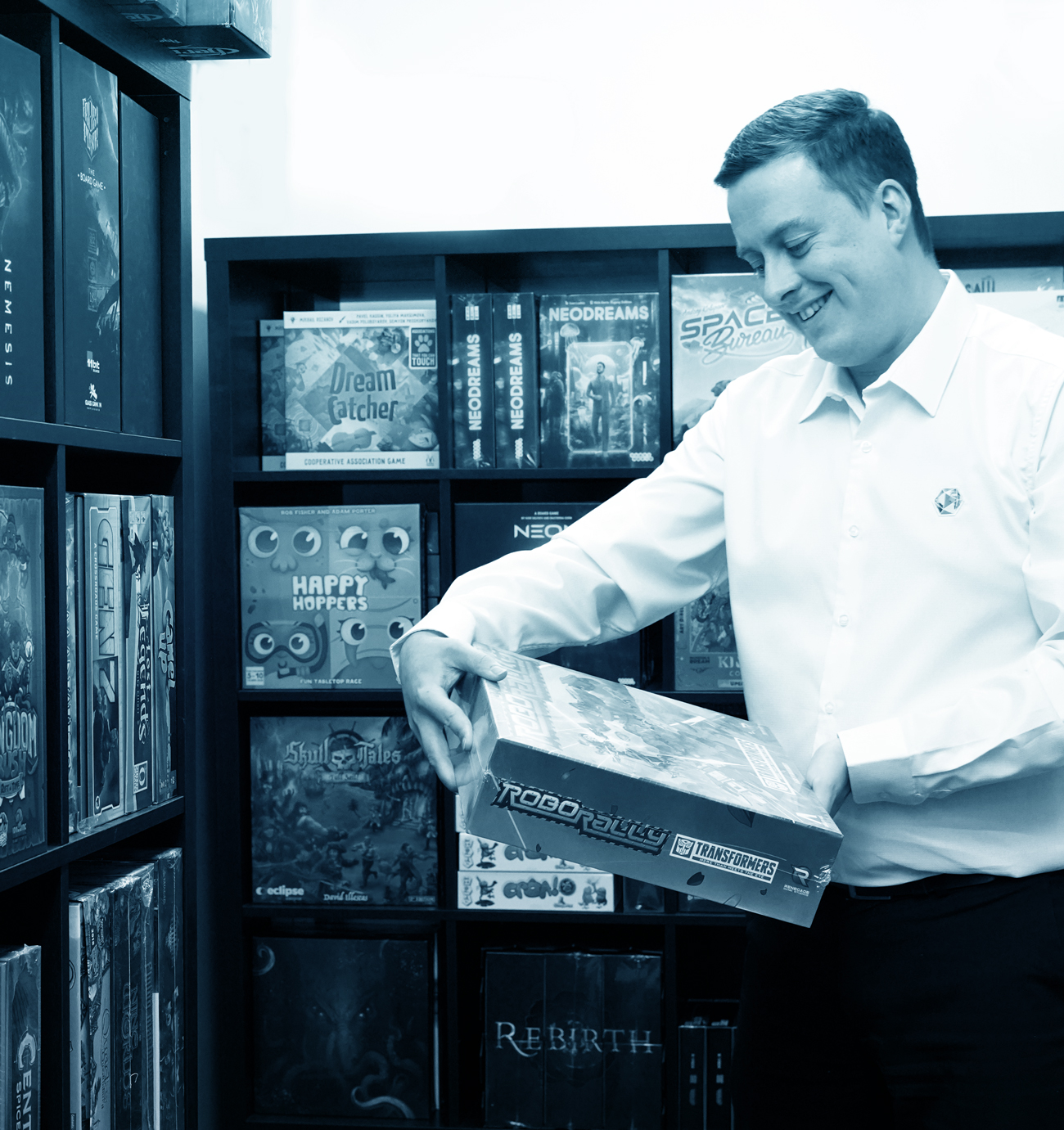 All About Games Marketing Specialist recommending board games in a retail setting.
