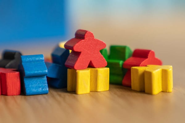 aagc-board-gamedevelopment-support-services-coloured-meeples